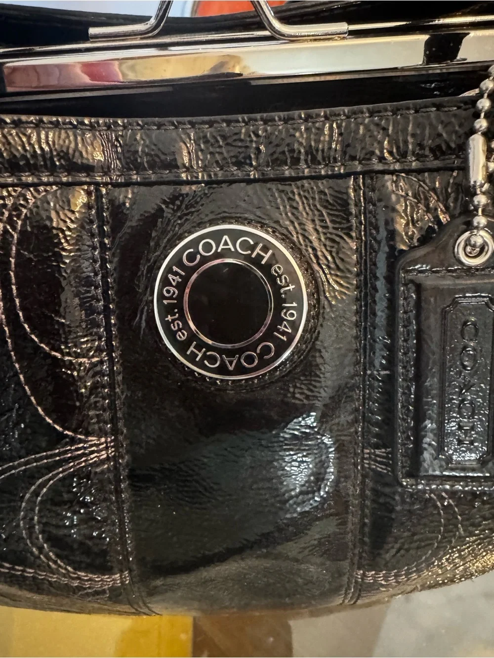 Coach glossy patent